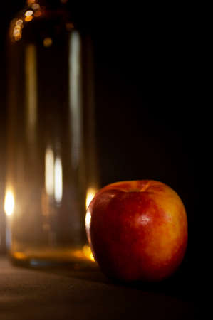 art photo abstract background from blurry spots of light and red appleの写真素材