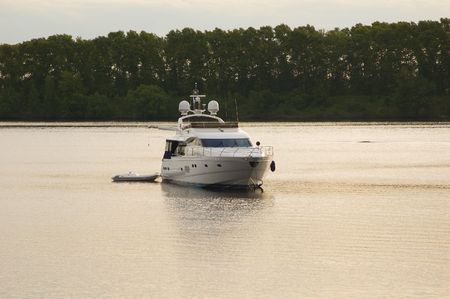 The modern motor yacht is beautiful costs on anchor parking