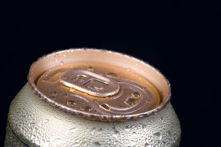 Drink in bank the covered dew against a dark backgroundの写真素材