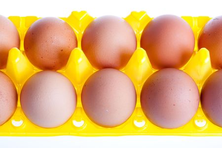 Dietary eggs in yellow plastic packing.の写真素材