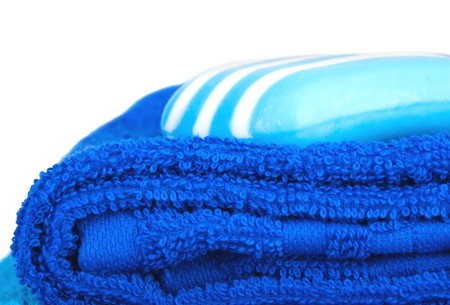 blue terry towels and soap on white background. Isolated.の写真素材
