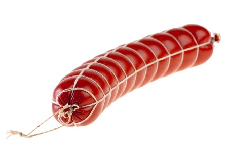 Long loaf of smoked sausage on white background. Isolated.の写真素材