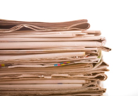 Set of old newspapers combined by a pileの写真素材