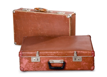 Two old suitcases. It is isolated on a white backgroundの写真素材