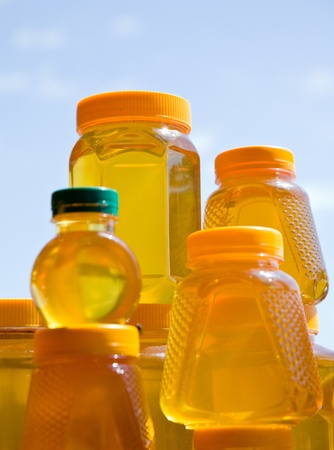 Bank with honey costs on a palmの写真素材