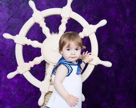 little girl in a dress in sailorの写真素材