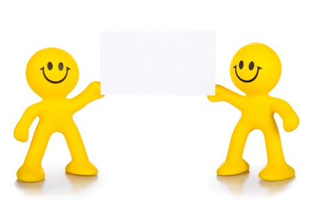 Two persons hold the pure white poster. A place for your textの写真素材