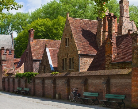 European small street with old brick houses. Bruges. Belgium.のeditorial素材