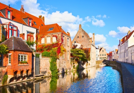 Classic view of channels of Bruges. Belgium. Medieval fairytale city. Summer urban landscape.のeditorial素材