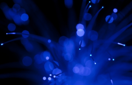 abstract background of  blue  optical fiber spot lightsの写真素材