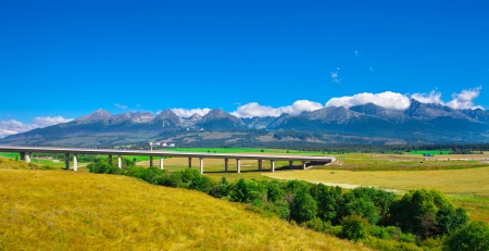Highway through fields at countryside in Slovakia, Eastern Europe の写真素材