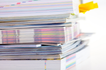 Closeup background of a pile of old magazinesの写真素材