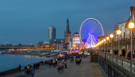 giant wheel at the Burgplatz in Dusseldorf is part of the local christmas market.のeditorial素材