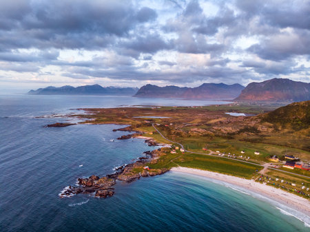 Scenic seascape at Hovsund fishing port on sunset, Gimsoya Lofoten Islands in Norwayの写真素材