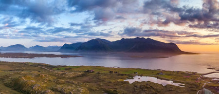 Scenic seascape at Hovsund fishing port on sunset, Gimsoya Lofoten Islands in Norwayの写真素材