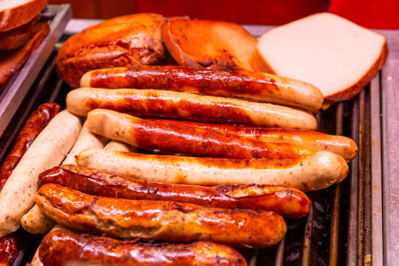 Grilled sausages at a festive Christmas marketの写真素材