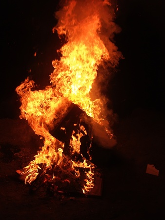a huge column of flames on a black backgroundの写真素材