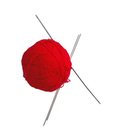 Red ball of yarn for knitting yarn with 3 missing through. Isolated on white backgroundの写真素材