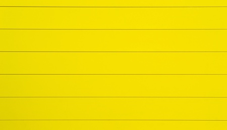 Yellow aluminum lines are horizontal. backgroundの写真素材