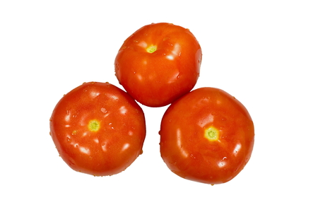 bright fresh tomato isolated on white backgroundの写真素材