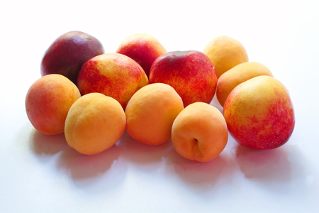 ripe juicy peaches isolate on white backgroundの写真素材