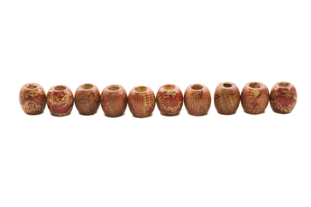 beads made of wood for decoration isolated on whiteの写真素材