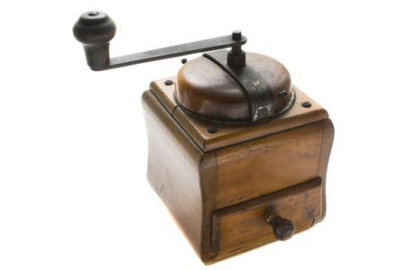 vintage wooden coffee grinder isolated on white backgroundの写真素材