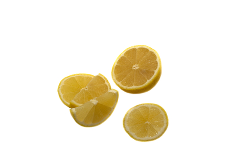 juicy lemon slices isolated on white backgroundの写真素材