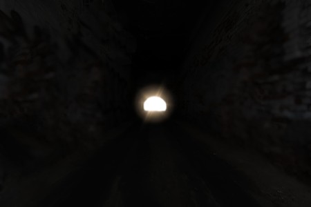 the bright light at the end of a dark tunnelの写真素材