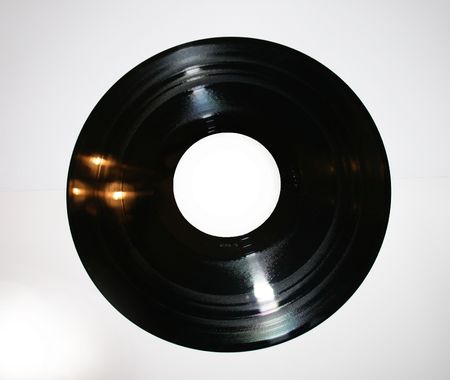 A vinyl record on a white background