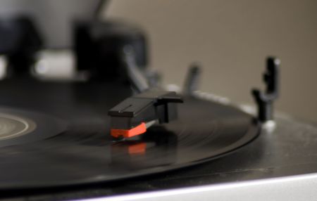 Closeup of a turntable playing a vinyl record