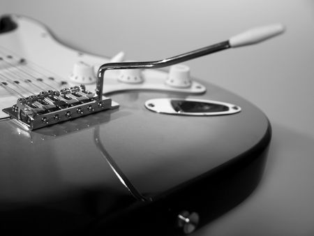 Black and white close up of neck of guitarの写真素材