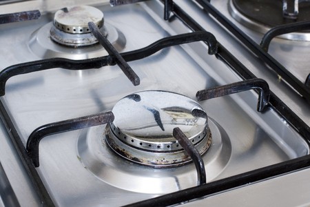 Closeup of metal gas stove without fire