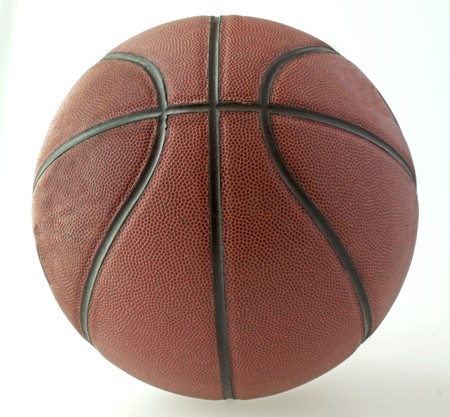 Close up of old and used orange basketballの写真素材