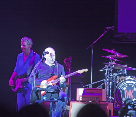 MILANO, ITALY - JULY 14: Singer and guitarist Mark Knopfler on stage of his own concert for "Milano Jazzin Festival", on July 13, 2010 at Arena civica of Milan, Italyのeditorial素材