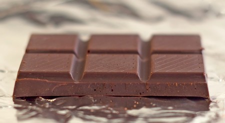 A table of chocolate over silver paperの写真素材