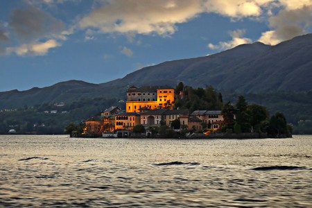 View of a little lighted island in a lake 