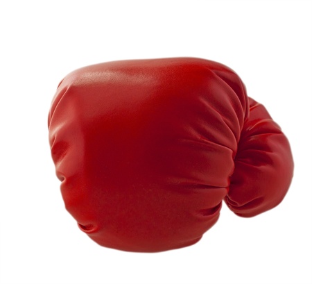 Red boxe glove throwing a punch, isolated over whiteの写真素材