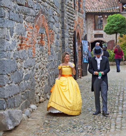 CANDELO, ITALY - JUNE 2: People in XIX century costume for the event "Artigiani d'Italia - Sapor d'Ottocento", June 2 to 5, 2011 at Candelo, Piedmont, Italy
 のeditorial素材