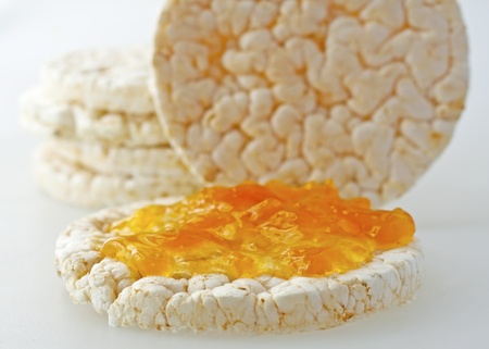 Close up of rice cakes with orange jamの写真素材