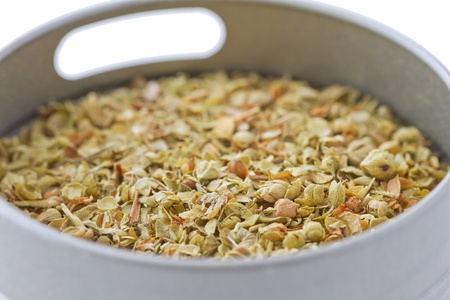 Close up of green spice oregano in a jarの写真素材