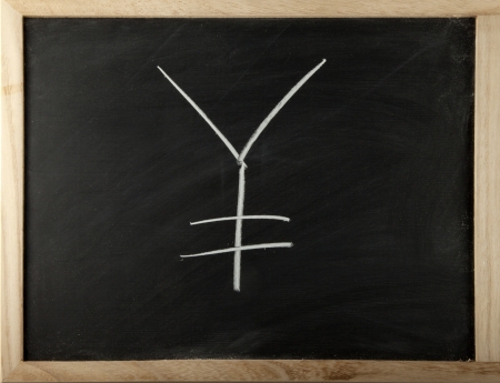 A blackboard with the symbol of yenの写真素材