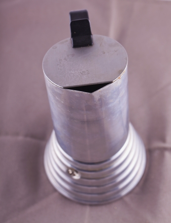 Close up of a cup of a metal coffeepot の写真素材