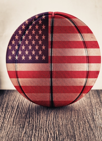 Close up of an old leather basketball with USA flagの写真素材