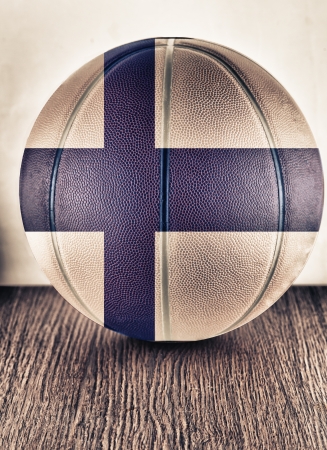 Close up of an old leather basketball with Finland flagの写真素材