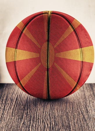 Close up of an old leather basketball with Macedonian flagの写真素材