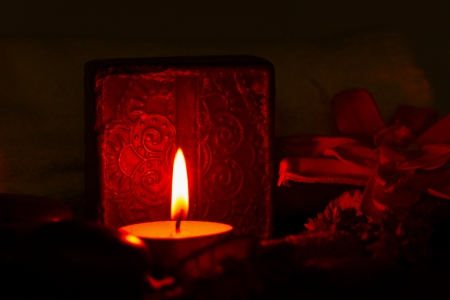 Brown soap, candle and towel over wooden backgroundの写真素材