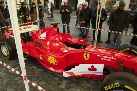 CASALE MONFERRATO, ITALY - DECEMBER 1ST: Single-seater Formula 1 Ferrari in "Christmas Fair" in piazza Mazzini, December 1, 2013 in Casale Monferrato, Italyのeditorial素材