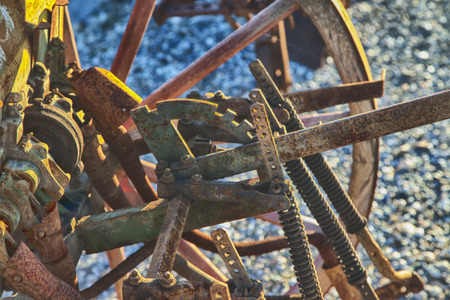 Old and rusty harrow in strict close upの写真素材