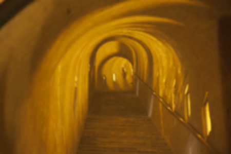 Tunnel with stairway semilighted defocused useful for background horizontal image